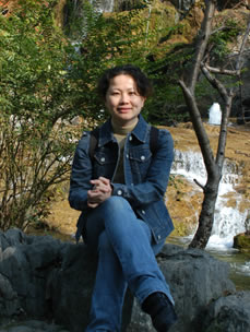 Lea in front of waterfall